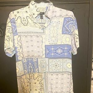 light blue bandanna shirt.